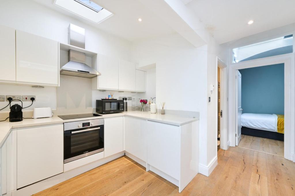 Appartement Cozy Hideaway In South Ken! à Londres Extérieur photo
